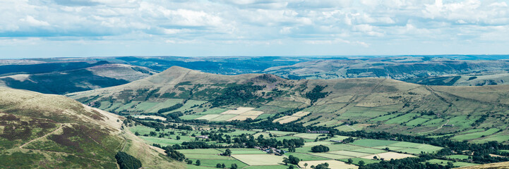 Obraz premium Beautiful field view on Edale village and Mam Tor at Peak District National Park, England, UK. Staycation concept of traveling local, banner size