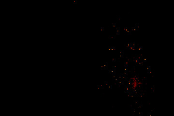 Fire particles on black background. Selecive focus. Great for overlay design