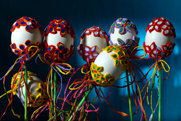 Easter decoration cute eggs. Happy Easter. Composition with white eggs  on dark background