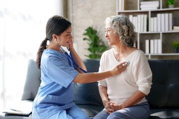 Asian female doctor examining a patient to assess the illness for proper treatment.