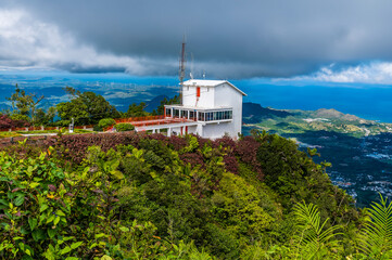 A view towards the cable car terminal from the summit of Mount Isabella in the Dominion Republic on a bright sunny day