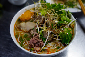 Delicious Bun Bo Hue with full veggies toppings
