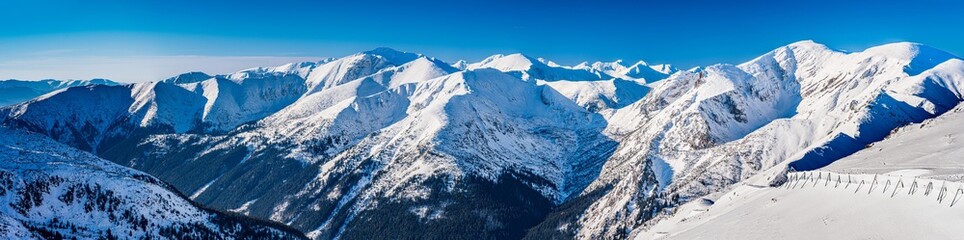 Fototapeta na wymiar Poland 2022. Beautiful view on the snow Tatry. Zakopane, Giewont, Kasprowy Wierch, Swinica, Rysy, Kresanica.