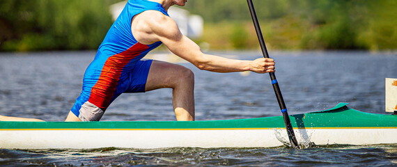 close up athlete canoeist rowing canoeing competition race