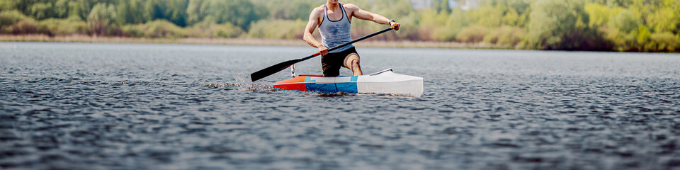 panorama athlete canoeist rowing in canoe competition race