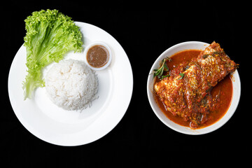 Asam Pedas Ikan translated as Spicy Sour Fish. Polular in Malaysia especially Malacca. Served on rice.