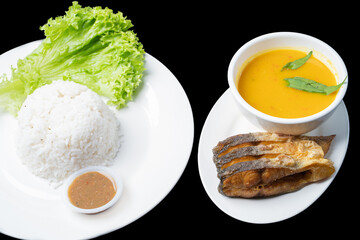 closeup Patin goreng is a Traditional Indonesian Food, served with rice.