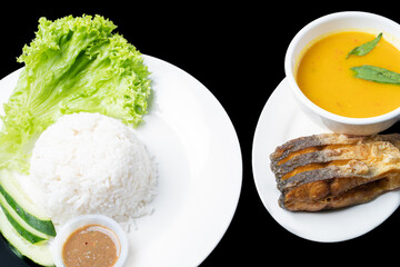 closeup Patin goreng is a Traditional Indonesian Food, served with rice.