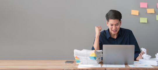 Hard working of asian people bookkeepers working with balance sheet and taxation, company quarterly reports of accounting and marketing. stressed, crazy, overworked