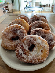 Closeup of Italian donuts or doughnuts called Graffe, typical from Naples in carnival in winter. Italian pastry from Napoli called graffe or graffette, traditional food during carnevale in February