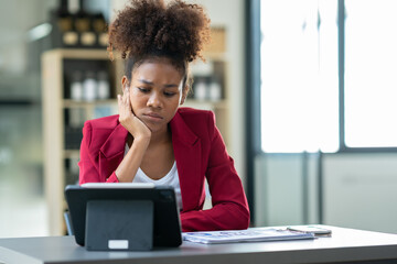 African american businesswoman looking at laptop Stress while reading news, reports or emails Online problems Financial mistakes problem-solving.