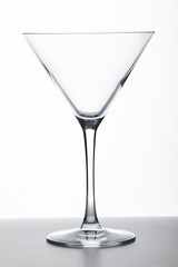 transparent and triangular cup of glass in a white background