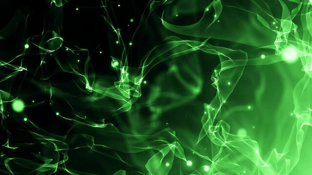 Super slow motion of green smoke sparks isolated on black background.