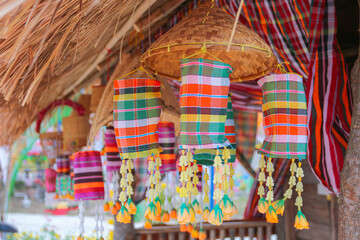An ancient merit-making tradition using objects and flags decorated according to religious beliefs.