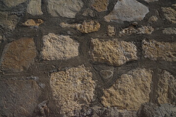 Texture of a stone wall. Old stone wall background.