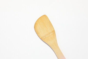 wooden spatula on a white surface