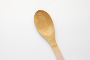 wooden spoon on white surface