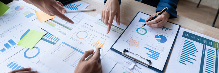 Asian business people brainstorming in a graph analytical computing plan meeting. data chart Marketing growth. Finance. The concept of business success statistics.