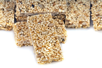 Sesame seeds Bar, Grain Bar, Nut Bars, Peanut Bar - sweet snack on white background