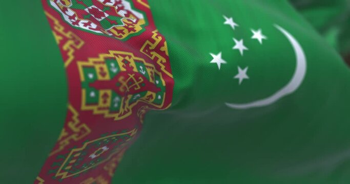 Detail of the Turkmenistan national flag waving in the wind