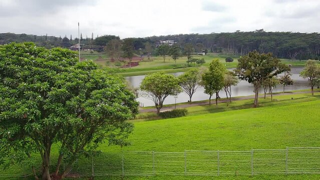 Aerial view of a beautiful lake and park in the center of the city
