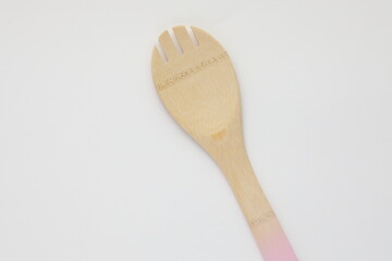 wooden fork on white surface