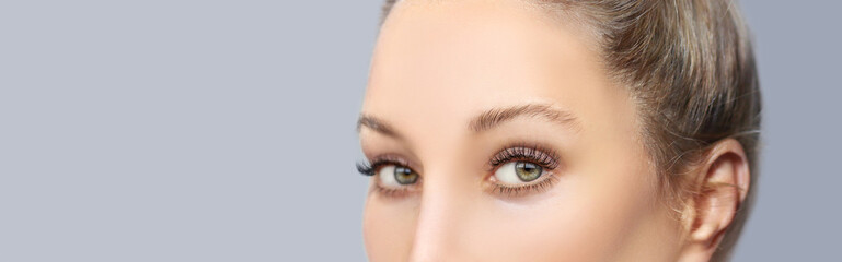 female green  eyes with makeup and long eyelashes