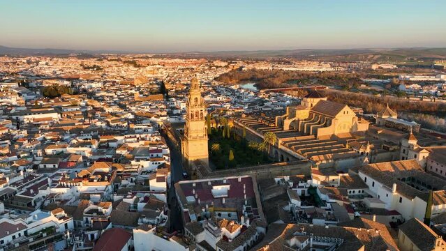Aerial view of the Alcazar of Cordoba, Spain. Flying over Mosque-Cathedral in Cordoba at sunset, Spain