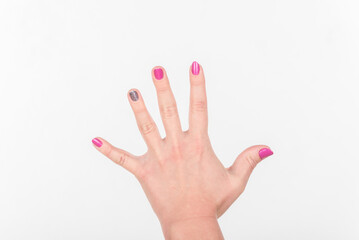Woman Hand with Spread Polish Fingers on White Background.