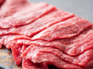 Obraz premium Fresh raw meat on stone plate