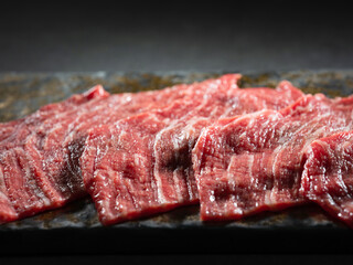 Fresh raw meat on stone plate