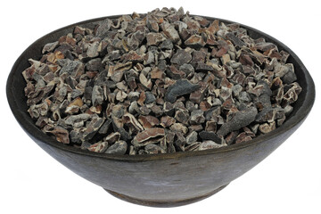 cocoa nibs in a wooden bowl isolated on white background