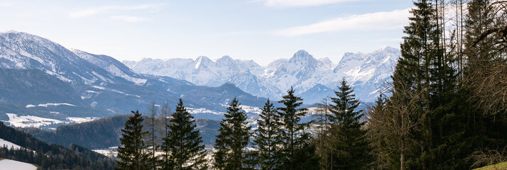 Snowy mountains in the green nature