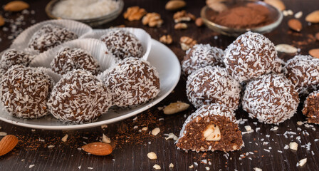 Lamington version: cocoa spheres with almonds and coconut flakes