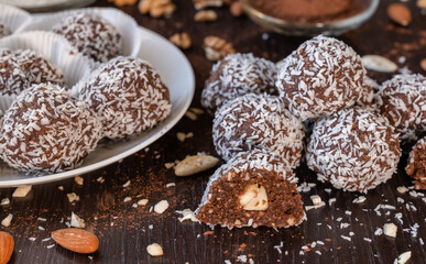 Lamington version: cocoa spheres with almonds and coconut flakes