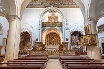 Tuinposter POLIGNANO A MARE, ITALY - MARCH 4, 2022: The nave of Cathedral Matrice wiht the ceiling by Lucas Alvese from begin of 17. cent. © Renáta Sedmáková