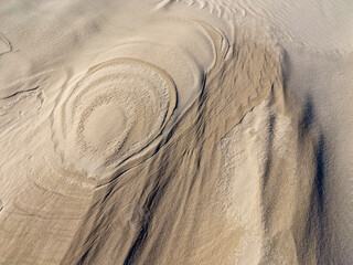 Fototapeta na wymiar texture of the sand, dark beige ivory marble, natural texture background