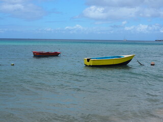 little boat on the turquoise ocean in the Caribbean - ocean view