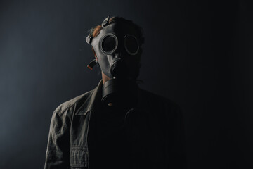 Photo of a military in a gas mask, apocalypse, nuclear weapons, atomic explosion of a station,...