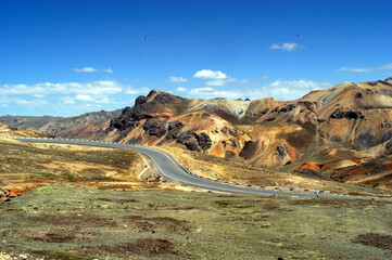 ayacucho peru mountain with curve on the road with asphalt in blue sky may 2020