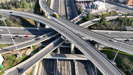 Aerial drone photo of modern Attiki Odos toll road interchange with National road in Attica, Athens, Greece