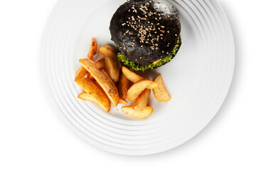 Black Hamburger with roast potato on a plate