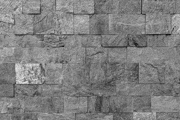 Stone gray wall as an abstract background.