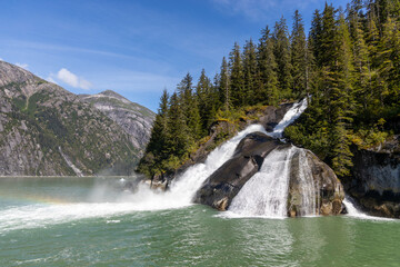 Icy Falls waterfall, located in Tracy Arm Fjord near the Sawyer Glaciers and Juneau, Alaska - obrazy, fototapety, plakaty