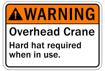 Overhead crane hazard sign and labels hard hat required when in use
