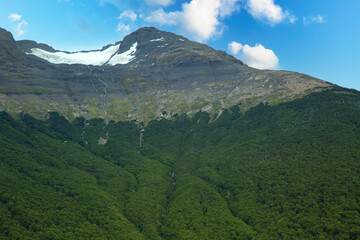 Ice in the top of the montain in El Calafate. Blue sky. Landscape background