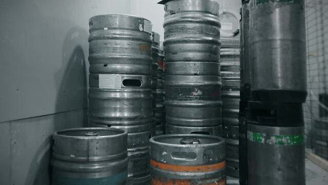 small warehouse in craft brewery, stainless steel kegs with alcoholic and non-alcoholic beer
