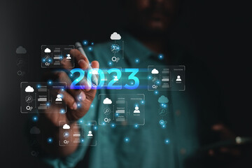 2023 business concept, businessman or engineer Show the trend of driving digital currency to develop online business.	