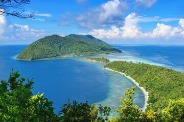 Kri Island viewpoint Raja Ampat, West Papua, Indonesia. View to the neighboring island Mansuar.