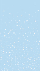 Beautiful snowfall christmas background. Subtle flying snow flakes and stars on light blue winter backdrop. Beautiful snowfall overlay template. Vertical vector illustration.